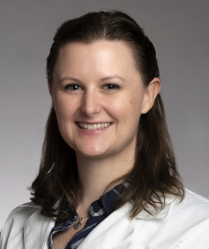Photo of Dr. Adrienne Topic, MD Photo of Dr. Adrienne Topic, MD